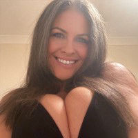 Denise Davies soaps her huge tits in the shower
